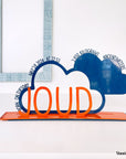 A decorative, customizable, colorful and modern gift for a newborn's or baby's room in the shape of a cloud, personalized to his name. Designed and produced by Steelouette.