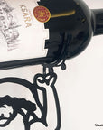Zoom in on a Santa Claus winesteelouette-christmas-santa-wine-holder-noelholder made of steel. A great gift idea for wine lovers for Christmas or the holidays! A product by Steelouette.