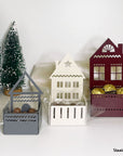 Steelouette Christmas chocolate boxes in the shape of houses, great for decorating your home during the holidays