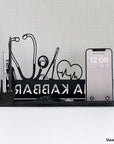 An office desk essential to gift a doctor or professor, can be used as a phone holder, pen holder, created by Steelouette