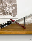 Modern design wine holder made of steel. A great gift idea for wine lovers and an original home decoration product by Steelouette.