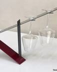 Modern design wine holder made of steel. A great gift idea for wine lovers and an original home decoration product by Steelouette.