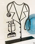 Steel decorative gift item featuring the lab coat of a doctor. A Customized useful gift for a doctor to decorate their office or home. Created by Steelouette.
