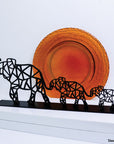 Steel decorative and gift item displaying three elephants arranged from largest to smallest, from left to right