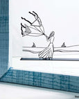 Steel decorative gift item featuring a woman flying two kites