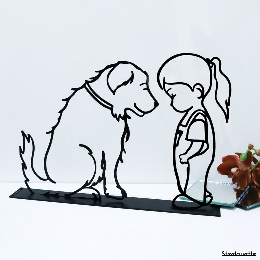Steel decorative gift item featuring a girl and a dog looking at one another