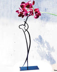 steel decorative gift item of person playing flute