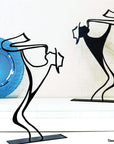 Steel decorative and gift item featuring a guy wearing a hat playing on the saxophone