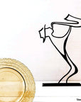 Steel decorative and gift item featuring a guy wearing a hat playing on the saxophone