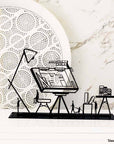 Steel decorative and gift item featuring a design plan created by an architect, engineer, planner, or designer.