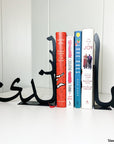 Book support is a steel decorative gift item featuring this sentence in arabic letters يا سندي