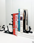 Book support is a steel decorative gift item featuring this sentence in arabic letters يا سندي