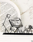 Steel decorative and gift item featuring a design plan created by an architect, engineer, planner, or designer.