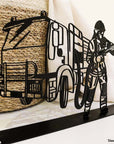 Steel decorative gift item featuring a firefighter