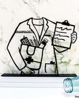 steel decorative gift item of a pharmacist coat medicine and doctor prescription