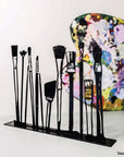 Steel decorative gift item featuring makeup kit brushes