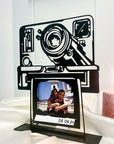 Steel decorative gift item featuring a polaroid camera