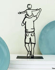 Steel decorative and gift item depicting a father carrying their son on their shoulders