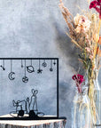 Steel decorative gift item featuring a couple laying on their back and looking at the stars