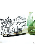 Steel decorative gift item featuring a grandmother and grandfather listening to radio music