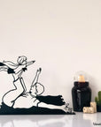 Steel decorative gift item featuring a father and son having fun together.