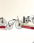 Steel decorative gift item showing the bike evolution