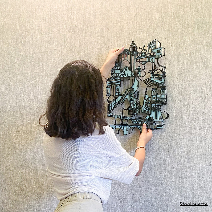 Wall hanged metal product showcasing the most famous architectural buildings of Paris city. A great gift idea and home decoration product by Steelouette.