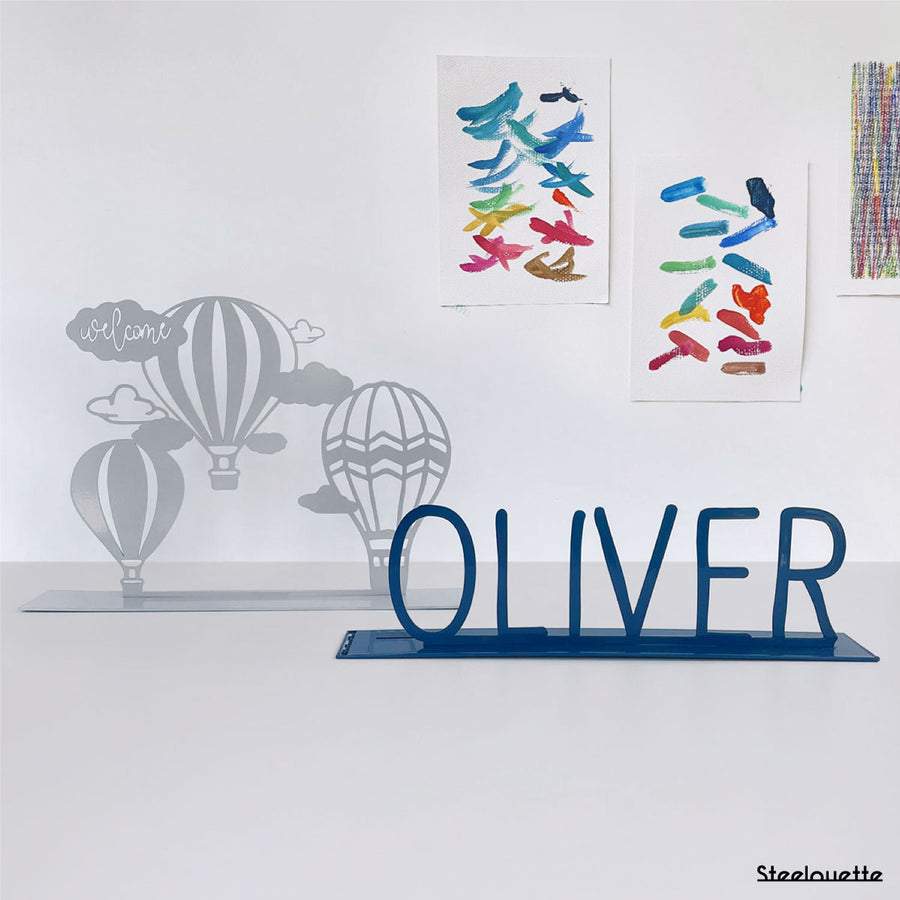 A gift for a newborn's or baby's room, personalized to his name. A decorative, customizable, colorful and modern design by Steelouette.