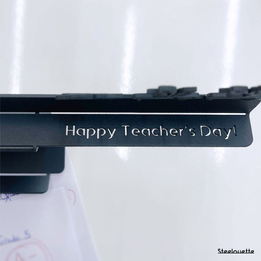 Zoom in on a desk office essential for teachers on teacher's day. A great corporate gift idea and office decoration product by Steelouette.