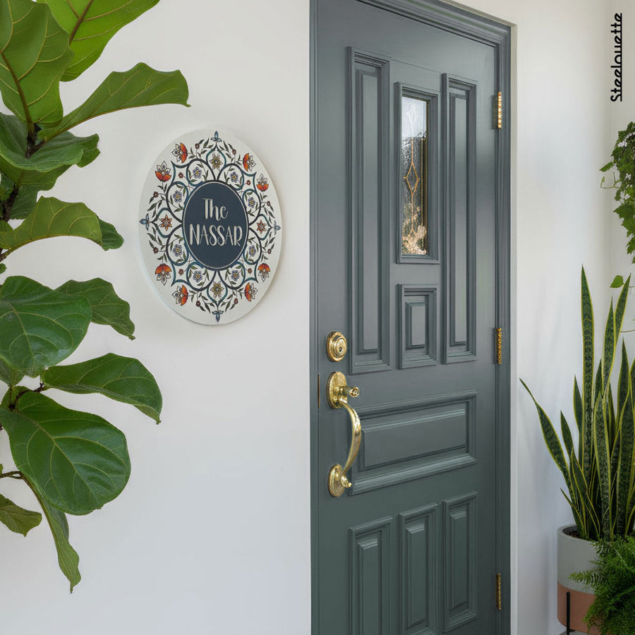 Wall hanged metal product of a door sign for your home, customized with your family name. A great gift idea and home decoration product by Steelouette.