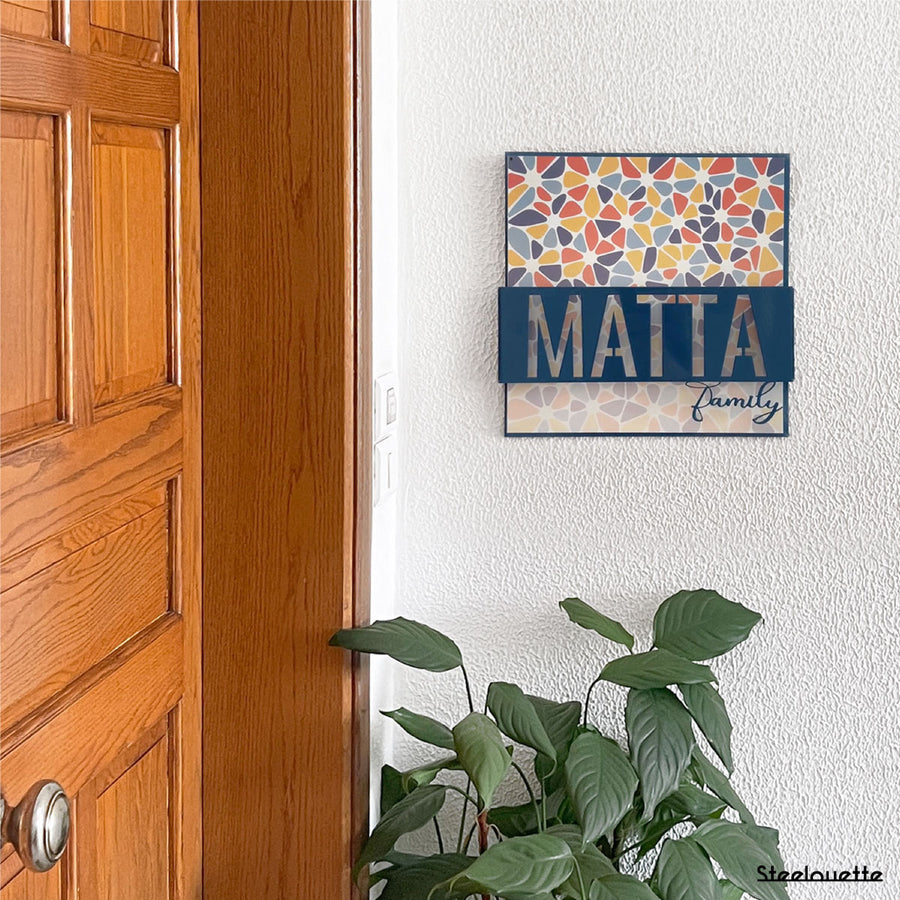 Wall hanged metal product of a door sign for your home, customized with your family name. A great gift idea and home decoration product by Steelouette.