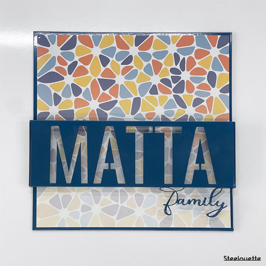 Wall hanged metal product of a door sign for your home, customized with your family name. A great gift idea and home decoration product by Steelouette.