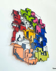 Wall hanged metal product showcasing a city of colorful houses. A great gift idea for your architect friends. A home decoration product by Steelouette.