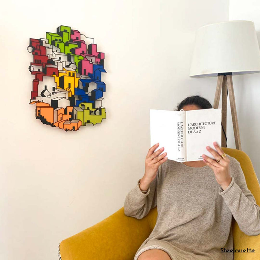 Wall hanged metal product showcasing a city of colorful houses. A great gift idea for your architect friends. A home decoration product by Steelouette.