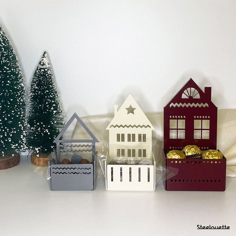 Steelouette Christmas chocolate boxes in the shape of houses, great for decorating your home during the holidays