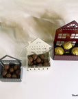 Steelouette Christmas chocolate boxes in the shape of houses, great for decorating your home during the holidays