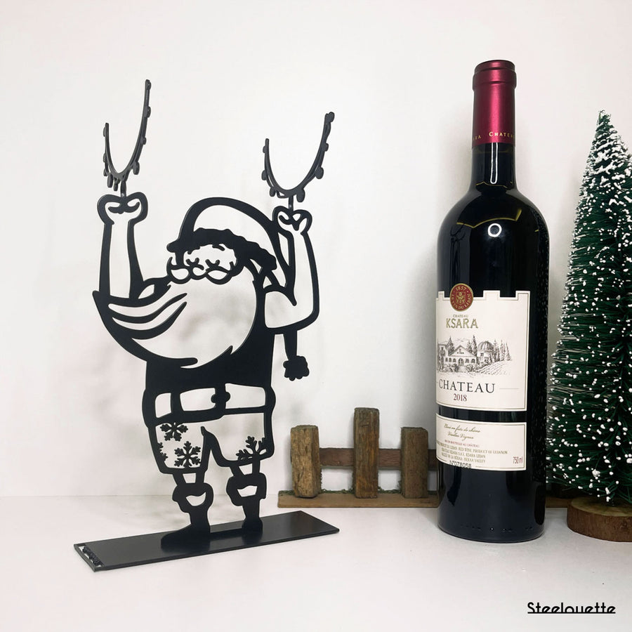 Santa Claus wine holder made of steel. A great gift idea for wine lovers for Christmas or the holidays! A product by Steelouette.