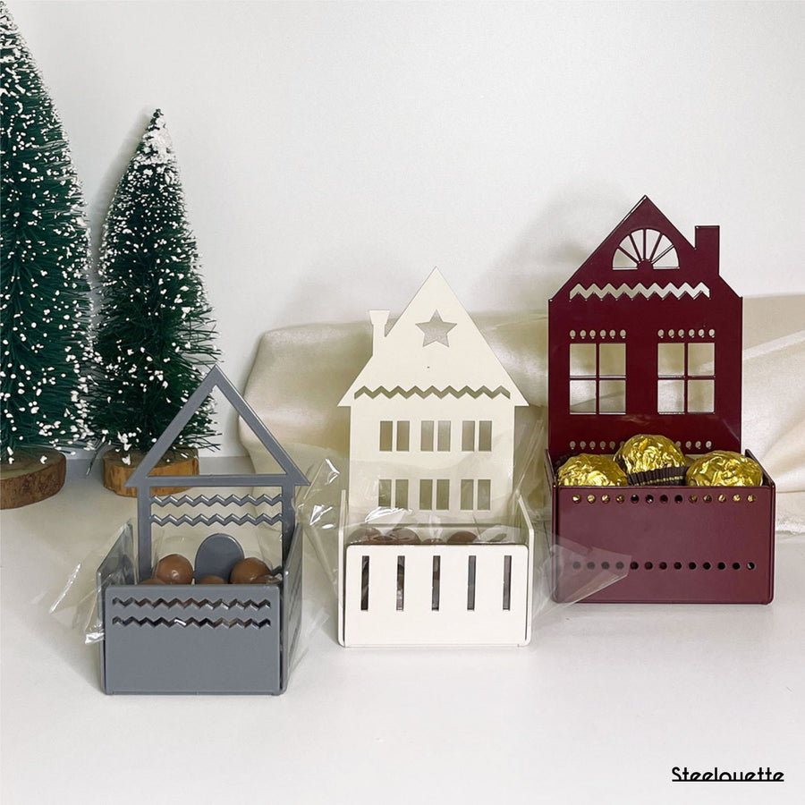 Steelouette Christmas chocolate boxes in the shape of houses, great for decorating your home during the holidays