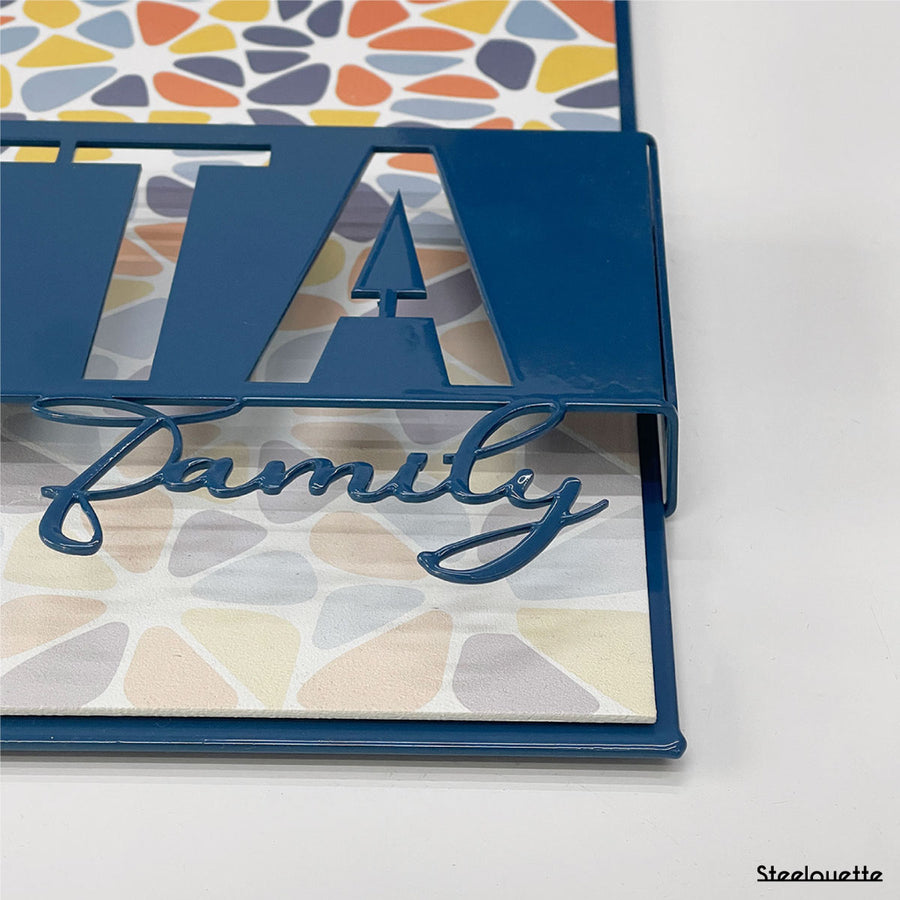 Wall hanged metal product of a door sign for your home, customized with your family name. A great gift idea and home decoration product by Steelouette.