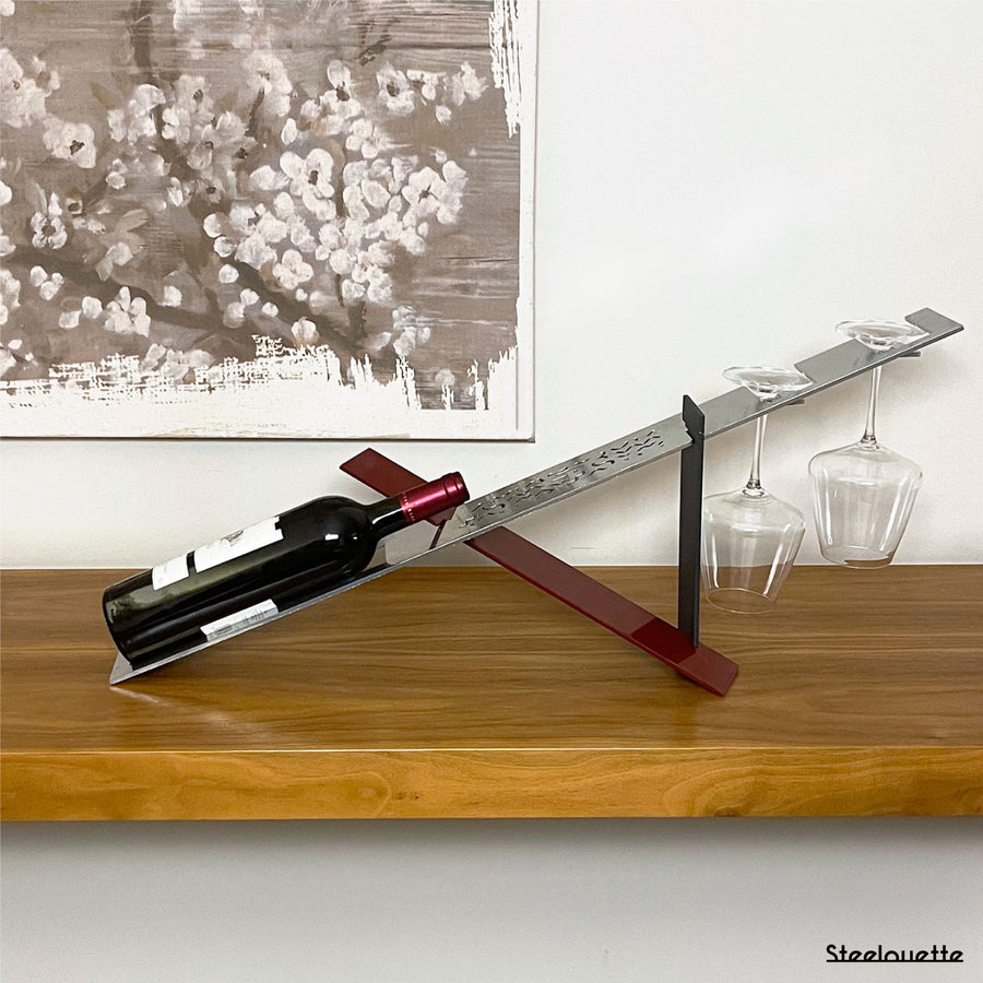 Modern design wine holder made of steel. A great gift idea for wine lovers and an original home decoration product by Steelouette.