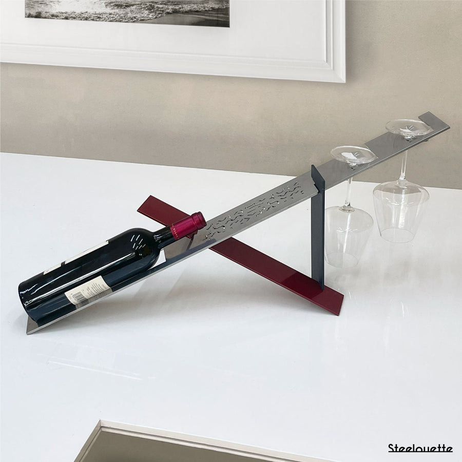 Modern design wine holder made of steel. A great gift idea for wine lovers and an original home decoration product by Steelouette.