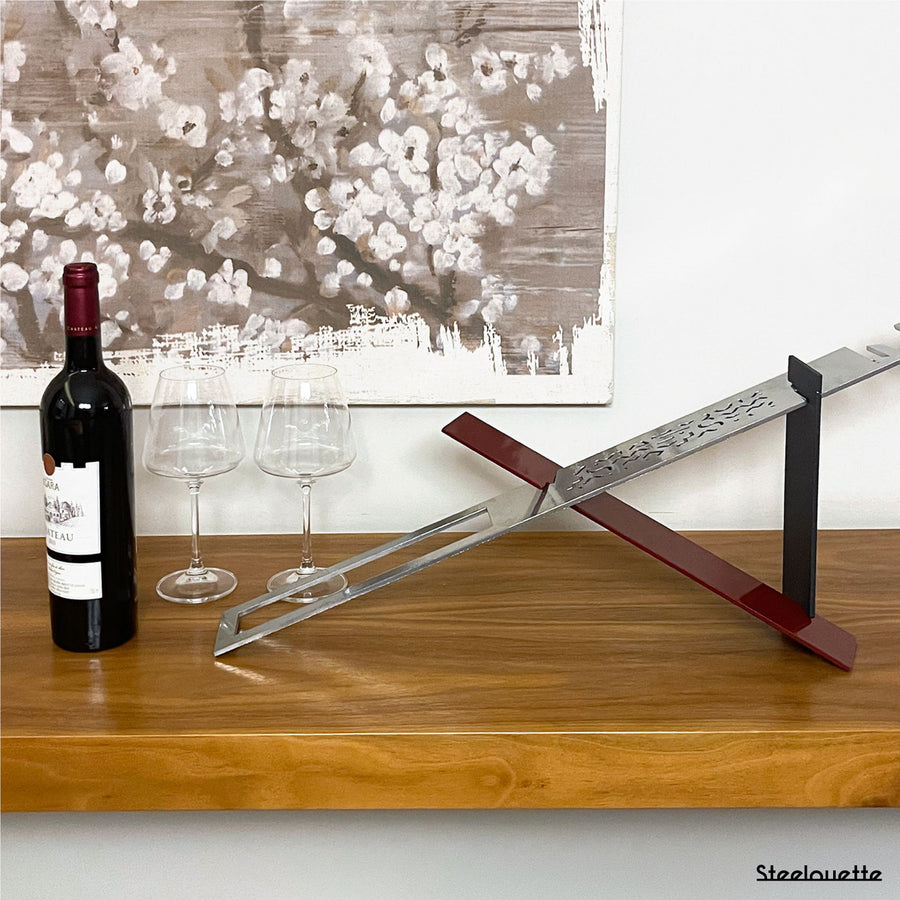 Modern design wine holder made of steel. A great gift idea for wine lovers and an original home decoration product by Steelouette.