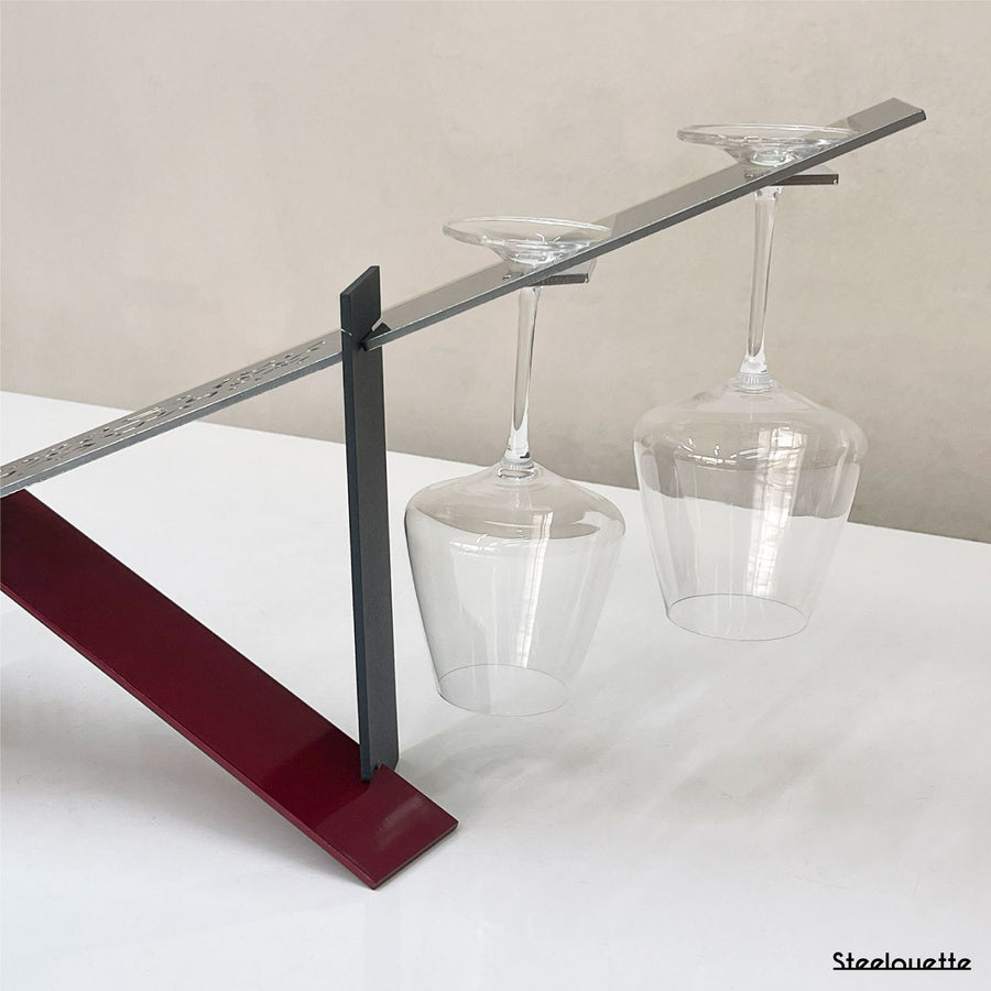 Modern design wine holder made of steel. A great gift idea for wine lovers and an original home decoration product by Steelouette.