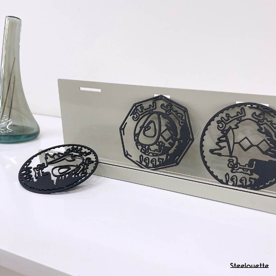Metal statue of the old lebanese lira coins. A great gift idea and home decoration product by Steelouette.