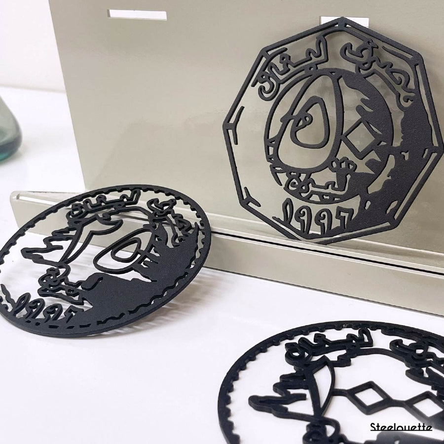 Metal statue of the old lebanese lira coins. A great gift idea and home decoration product by Steelouette.