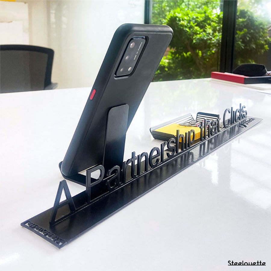 A customized idea, phone holder or steel product. A great gift idea and home decoration product by Steelouette