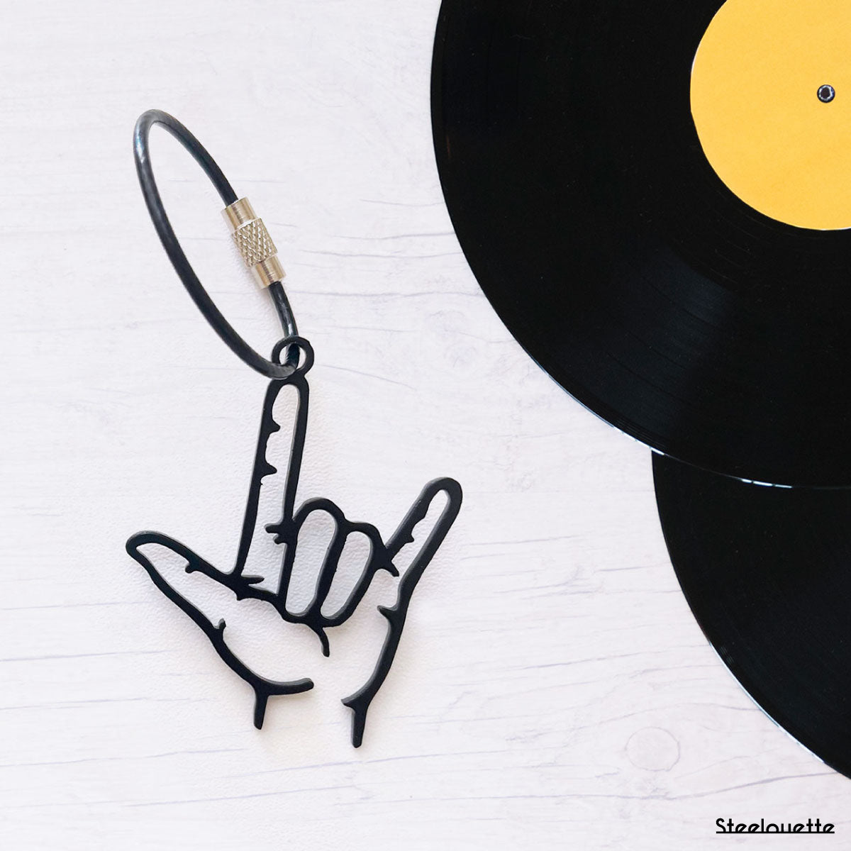 Rock Sign Keychain – Steelouette