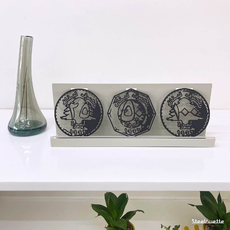Metal statue of the old lebanese lira coins. A great gift idea and home decoration product by Steelouette.