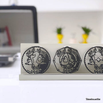 Metal statue of the old lebanese lira coins. A great gift idea and home decoration product by Steelouette.