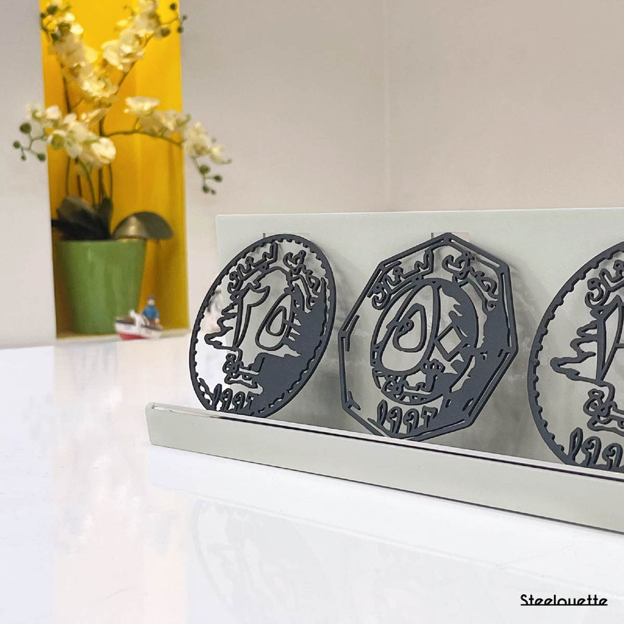 Metal statue of the old lebanese lira coins. A great gift idea and home decoration product by Steelouette.